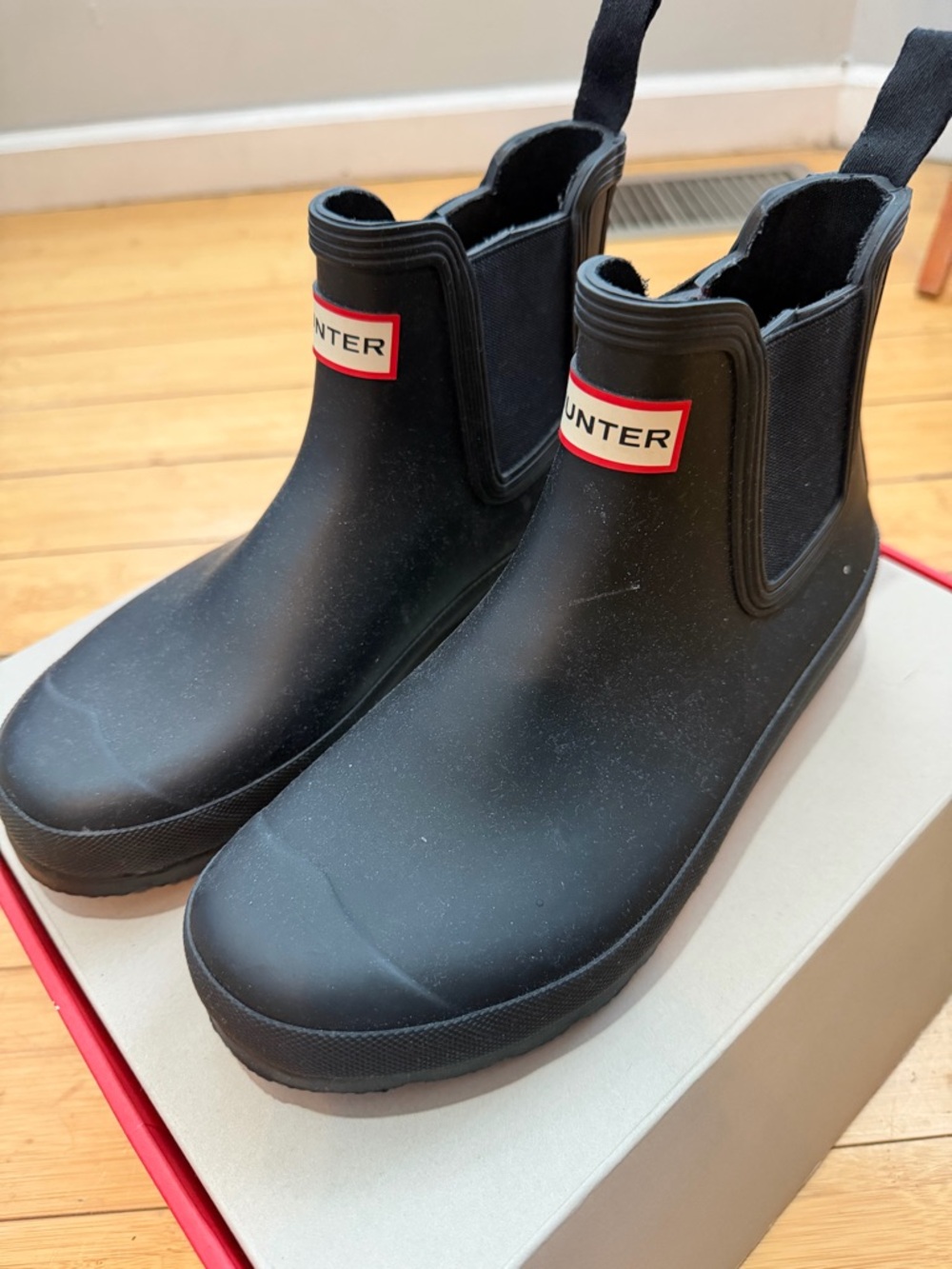 Hunter Black Chelsea-Style Rain Boots with Red Logo Trim